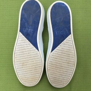 Rothy’s white slip ons. Only worn a few times.size 9.5 Great condition.